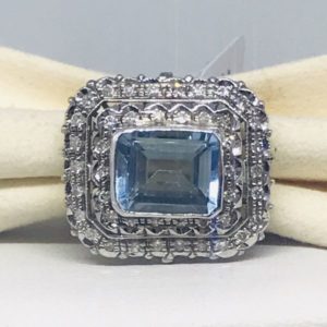 anello oro bianco con pietra preziosa azzurro trasparente gioielli torino