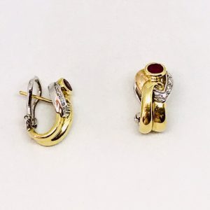 orecchini in oro con pietra nera gioielli torino