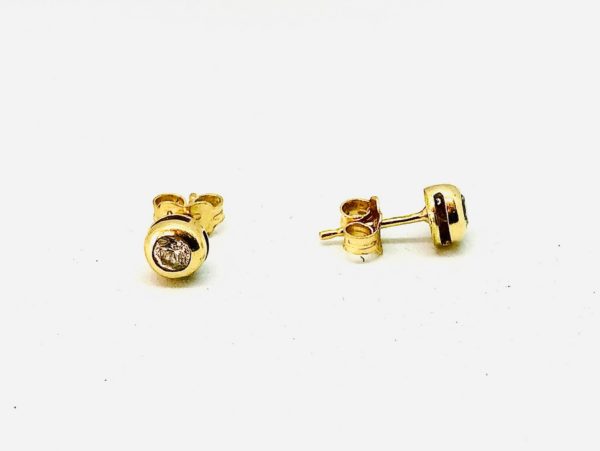 orecchini in oro con pietre gioielli torino